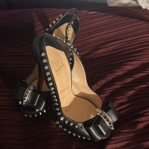 Authentic Christia Louboutin shoes.